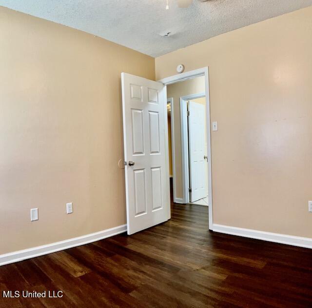 2614 George St, Gulfport, MS 39503 - empty room featuring baseboards and wood finished floors