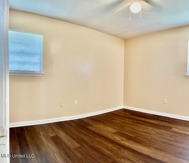 2614 George St, Gulfport, MS 39503 - empty room featuring a ceiling fan, wood finished floors, and baseboards
