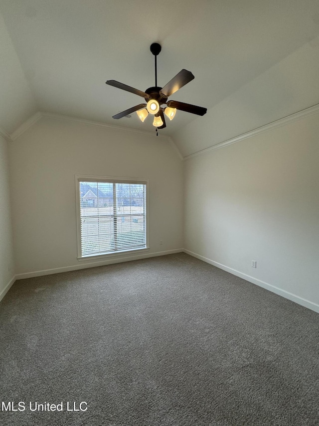 unfurnished room with baseboards, carpet, and vaulted ceiling