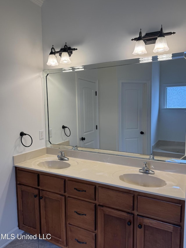 full bathroom featuring double vanity and a sink