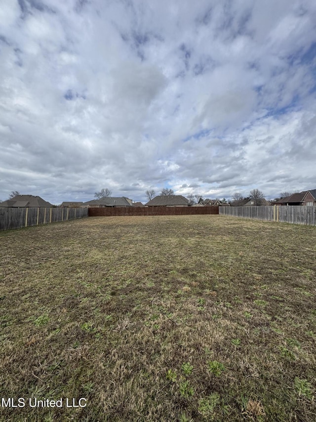 view of yard featuring a fenced backyard