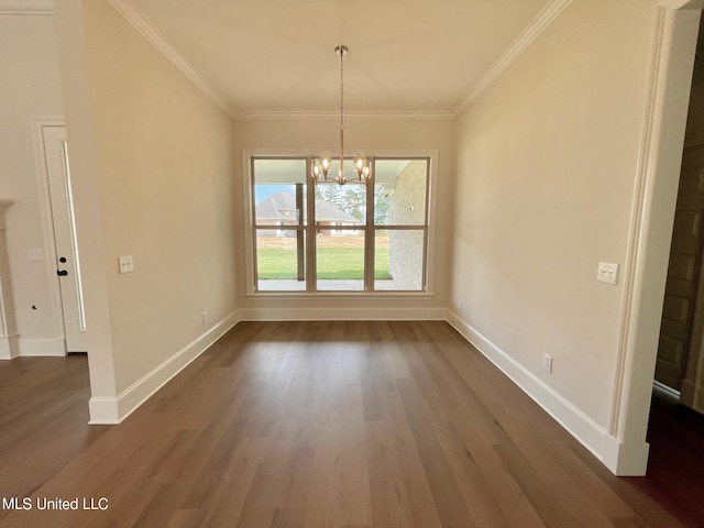 unfurnished dining area with ornamental molding, a notable chandelier, and dark hardwood / wood-style flooring