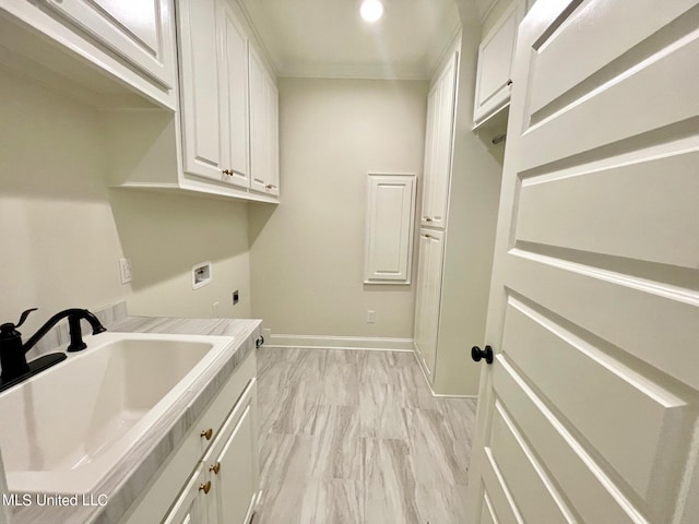 washroom with hookup for an electric dryer, cabinets, sink, and hookup for a washing machine