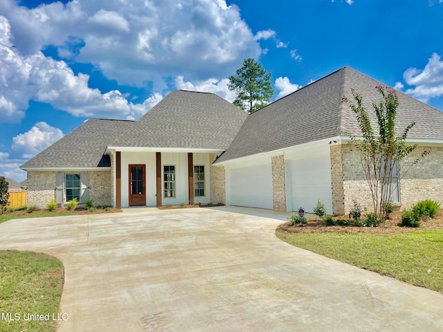 view of front of home with a garage