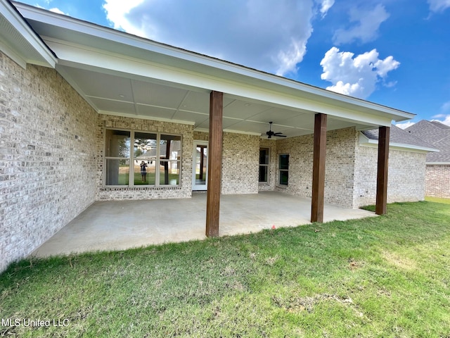 exterior space with ceiling fan