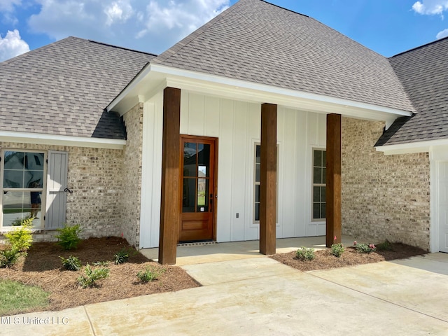 property entrance featuring a patio