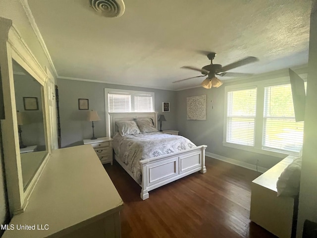 409 Coleman St, Como, MS 38619 - bedroom featuring dark wood-style floors, crown molding, and a ceiling fan