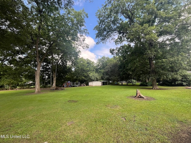409 Coleman St, Como, MS 38619 - view of green lawn with view of scattered trees
