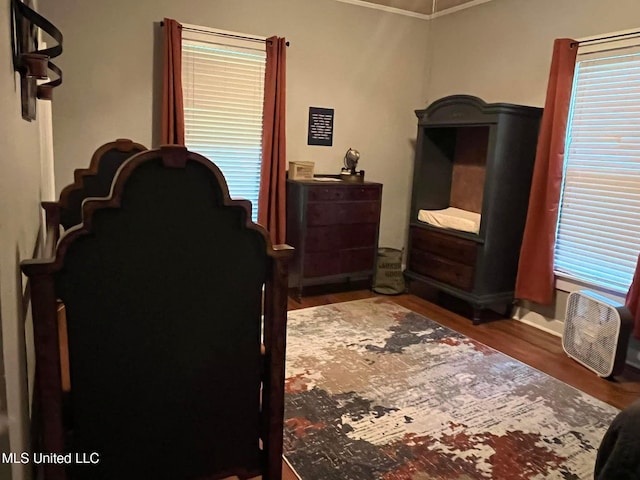 409 Coleman St, Como, MS 38619 - bedroom with crown molding and wood finished floors