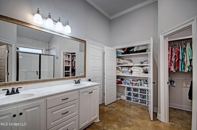 bathroom featuring a sink, concrete floors, a stall shower, and ornamental molding
