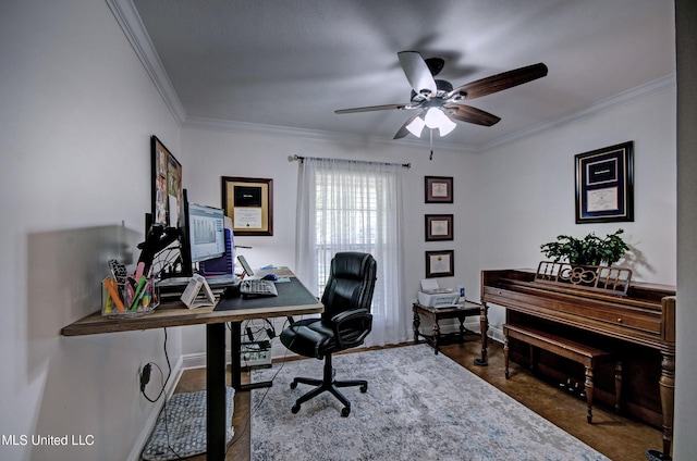 office area featuring a ceiling fan, baseboards, and ornamental molding