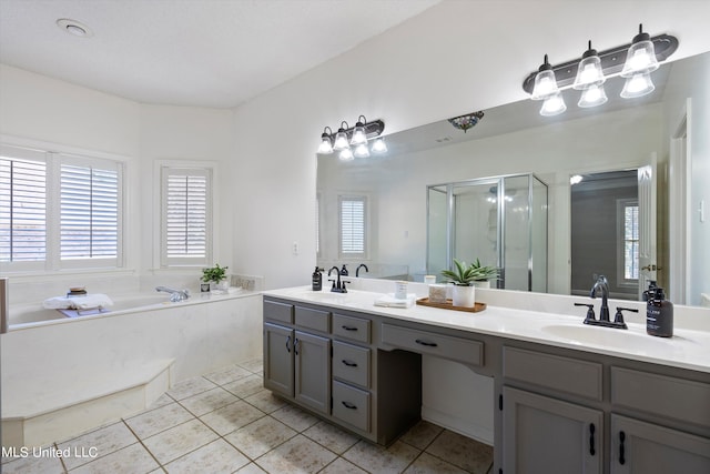 bathroom with vanity, shower with separate bathtub, and tile patterned flooring