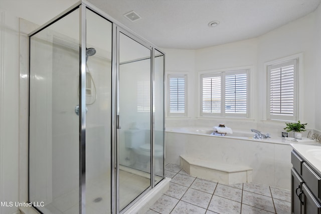 bathroom with vanity, independent shower and bath, and tile patterned floors