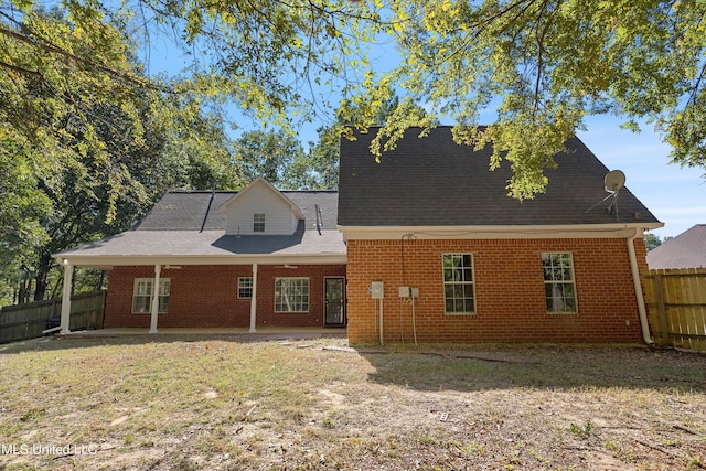 back of house with a patio area