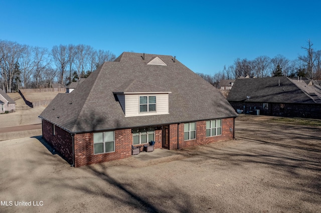 rear view of property with a patio