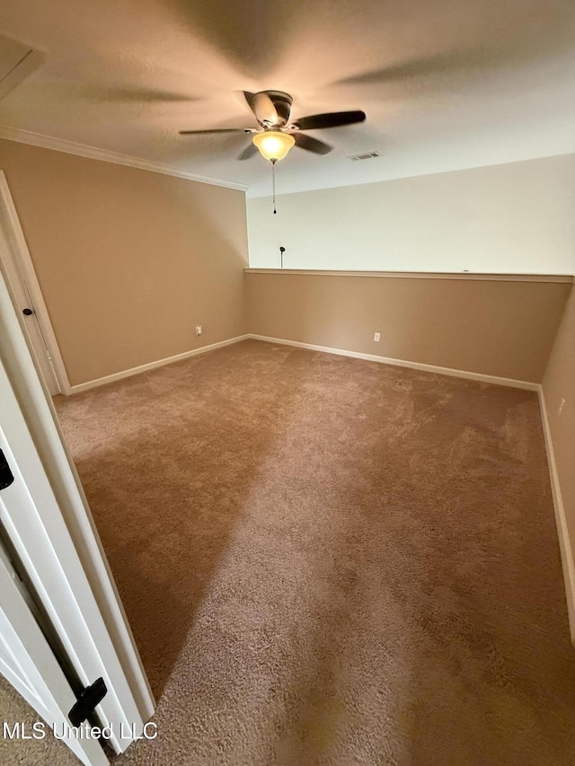 7419 Rose Garden Ln, Olive Branch, MS 38654 - carpeted empty room featuring ceiling fan, baseboards, and ornamental molding
