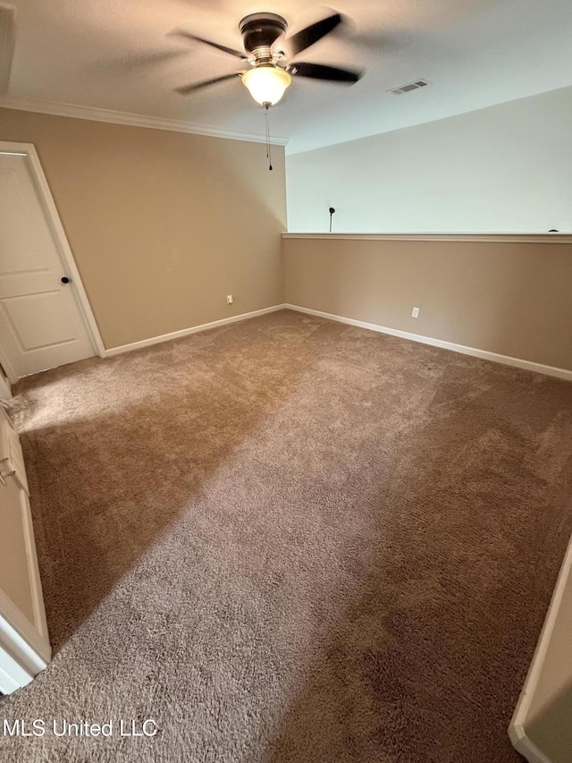 7419 Rose Garden Ln, Olive Branch, MS 38654 - carpeted spare room featuring ceiling fan, crown molding, and baseboards
