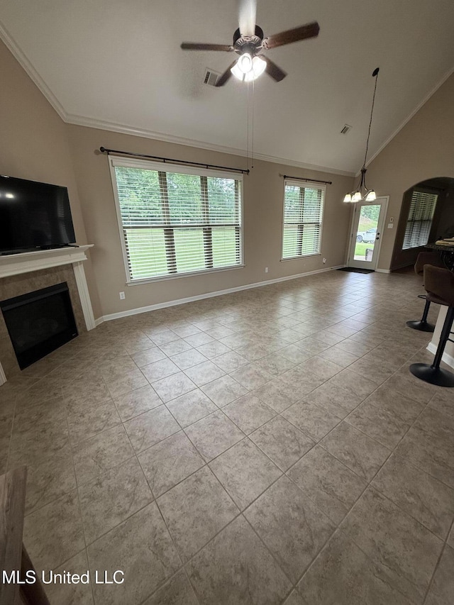 7419 Rose Garden Ln, Olive Branch, MS 38654 - unfurnished living room featuring ceiling fan, tile patterned flooring, a fireplace, baseboards, and crown molding