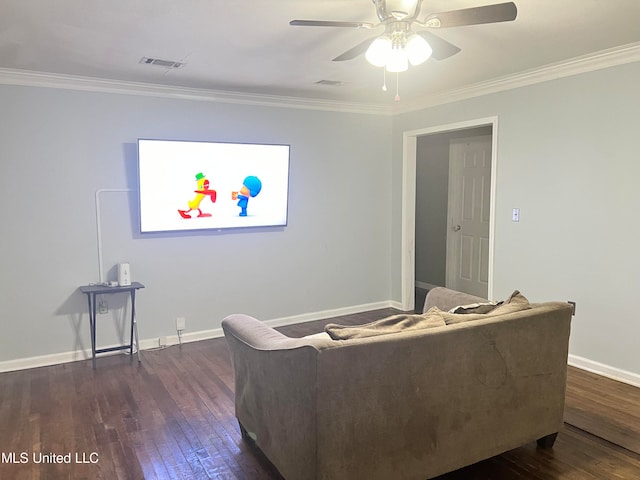 living room with dark wood-type flooring, crown molding, and ceiling fan