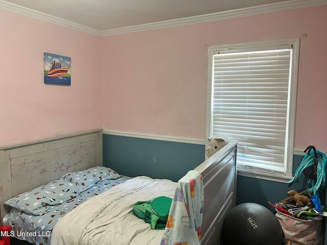 bedroom featuring crown molding