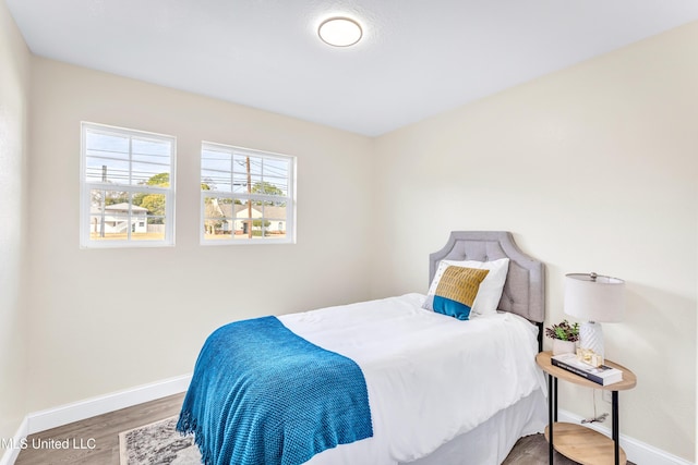 bedroom featuring hardwood / wood-style floors