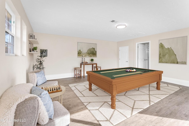 recreation room with pool table and light wood-type flooring