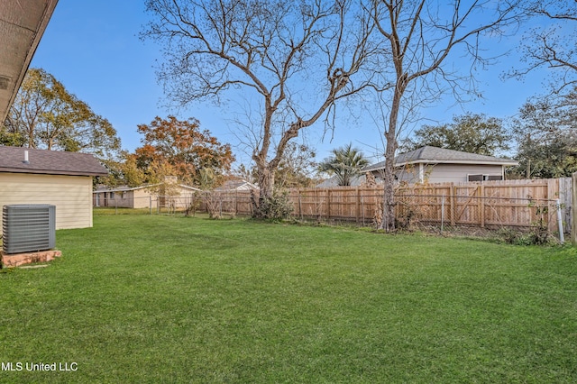 view of yard featuring central AC