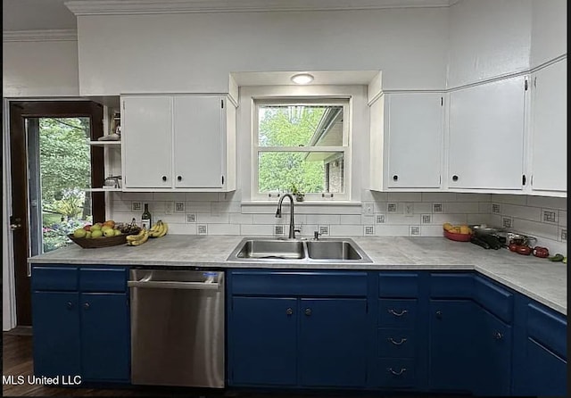 305 Dettor St, Batesville, MS 38606 - kitchen featuring stainless steel dishwasher, blue cabinetry, a sink, open shelves, and crown molding