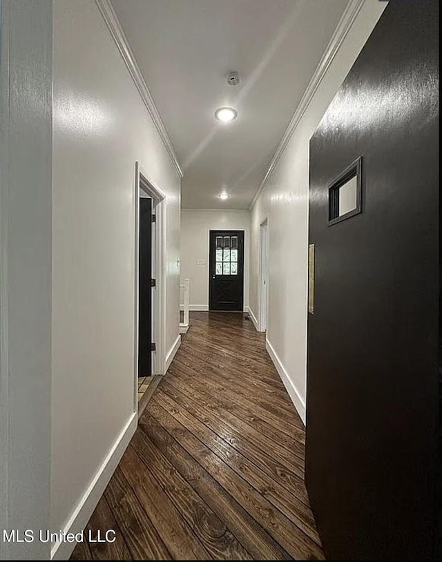 305 Dettor St, Batesville, MS 38606 - hall with crown molding, dark wood-type flooring, baseboards, and recessed lighting