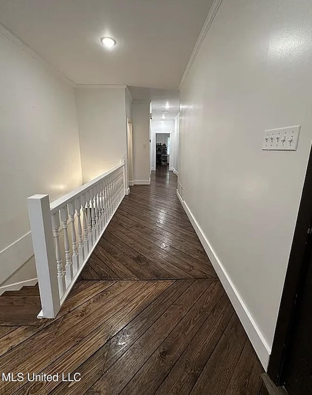 305 Dettor St, Batesville, MS 38606 - corridor with baseboards, an upstairs landing, wood finished floors, and crown molding