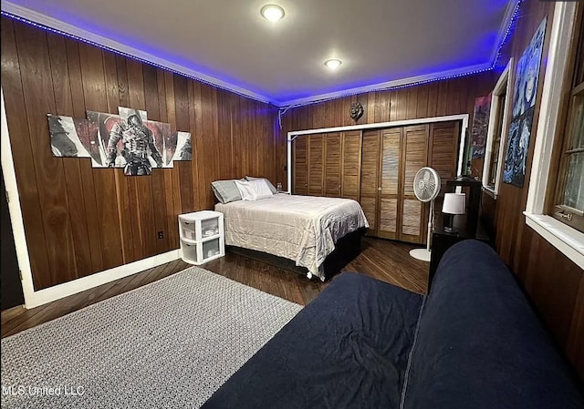305 Dettor St, Batesville, MS 38606 - bedroom with wood walls and wood finished floors