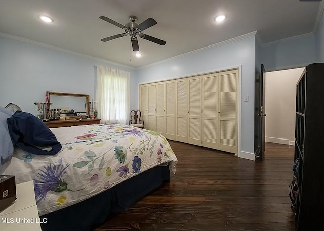 305 Dettor St, Batesville, MS 38606 - bedroom featuring dark wood-style flooring, crown molding, a closet, recessed lighting, and baseboards