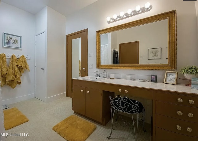 305 Dettor St, Batesville, MS 38606 - full bathroom featuring vanity and baseboards