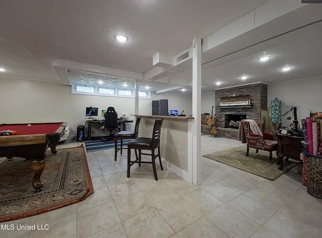 305 Dettor St, Batesville, MS 38606 - rec room with a brick fireplace, light tile patterned flooring, pool table, and recessed lighting
