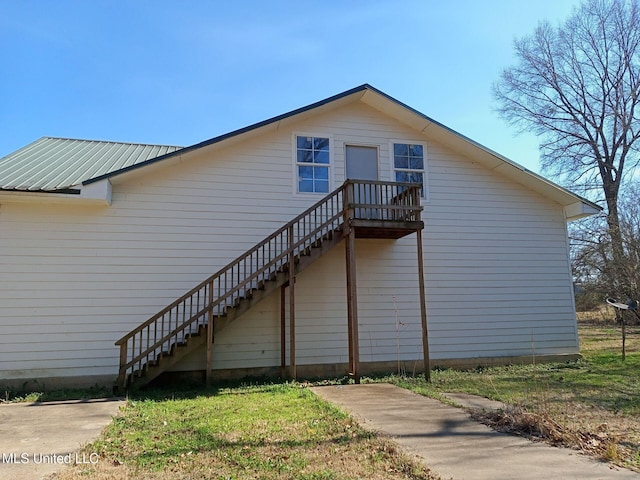 9219 Anding Oil City Rd, Bentonia, MS 39040 - view of side of property featuring metal roof and stairs