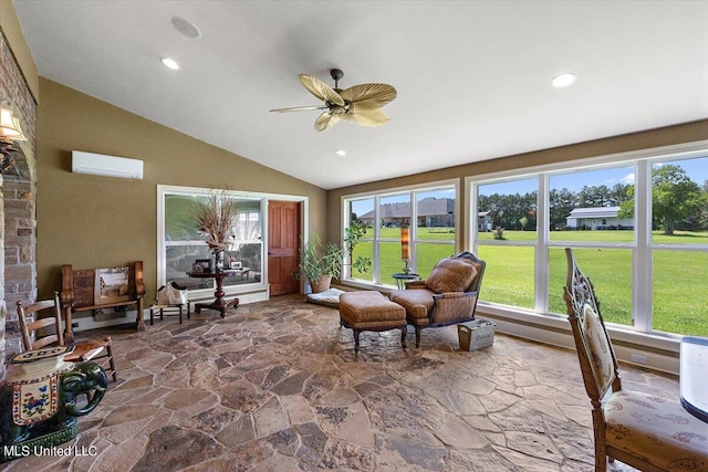 sunroom / solarium with a wall mounted air conditioner, ceiling fan, plenty of natural light, and vaulted ceiling