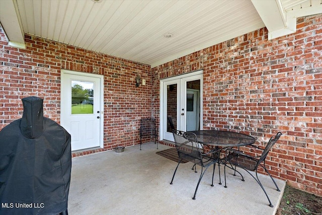 view of patio featuring a grill