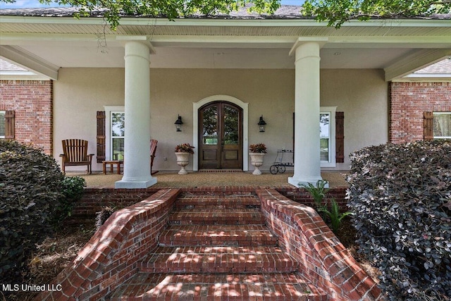 property entrance with french doors and covered porch