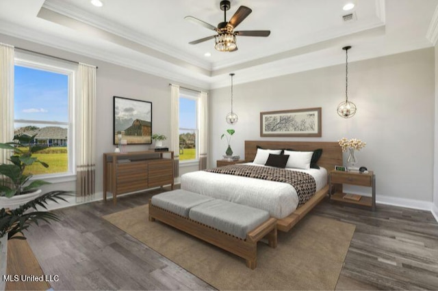 620 Old Savannah Dr, Long Beach, MS 39560 - bedroom featuring a tray ceiling, wood finished floors, ornamental molding, baseboards, and recessed lighting