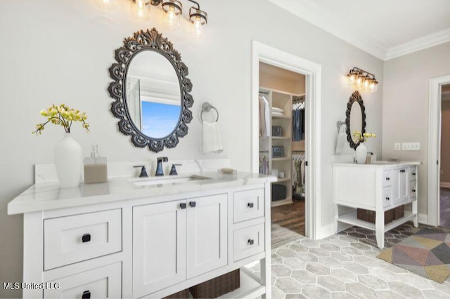 620 Old Savannah Dr, Long Beach, MS 39560 - bathroom featuring ornamental molding and vanity