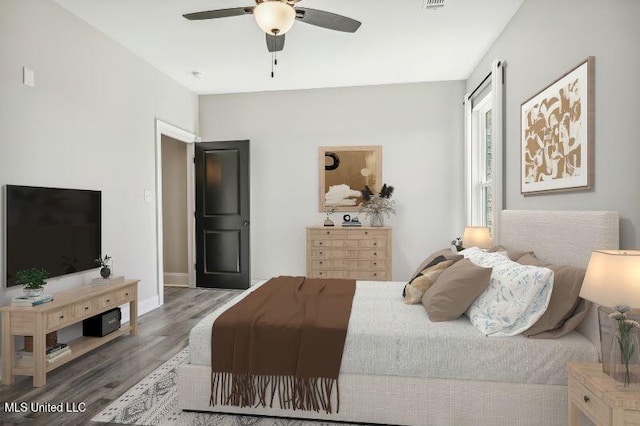 620 Old Savannah Dr, Long Beach, MS 39560 - bedroom featuring wood finished floors, ceiling fan, and baseboards