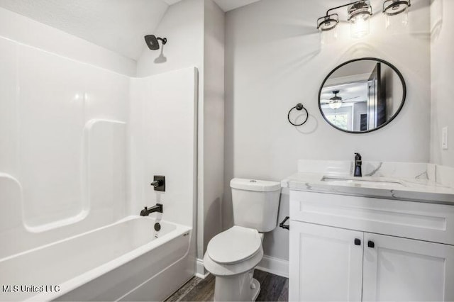 620 Old Savannah Dr, Long Beach, MS 39560 - full bath featuring baseboards, wood finished floors, toilet, bathing tub / shower combination, and vanity