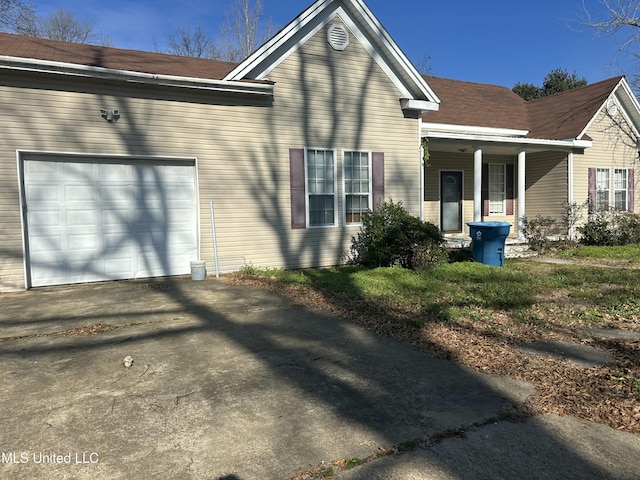 view of property exterior with a garage