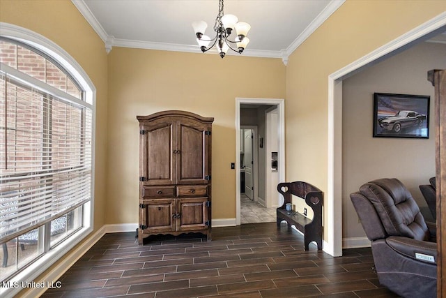 interior space with crown molding, a wealth of natural light, and a chandelier