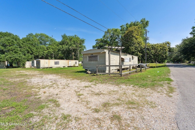 2301 16th Ave, Gulfport, MS 39501 - view of yard featuring an outdoor structure and a storage unit