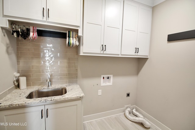 119 Shore View Dr, Madison, MS 39110 - clothes washing area featuring hookup for an electric dryer, hookup for a washing machine, cabinet space, and baseboards