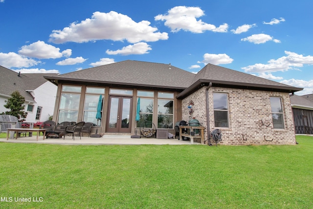 119 Shore View Dr, Madison, MS 39110 - back of house featuring a patio area, brick siding, french doors, a lawn, and a shingled roof