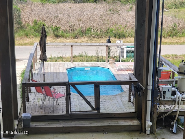 4024 Honshu St, Bay Saint Louis, MS 39520 - view of swimming pool with a wooden deck