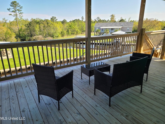 4024 Honshu St, Bay Saint Louis, MS 39520 - wooden terrace with an outdoor hangout area and a lawn