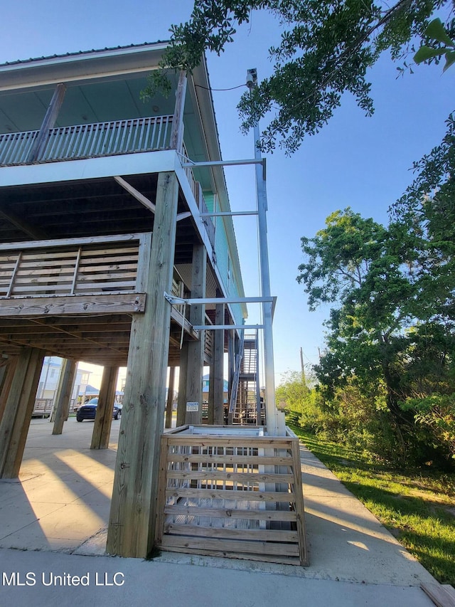4024 Honshu St, Bay Saint Louis, MS 39520 - exterior space featuring stairs and metal roof